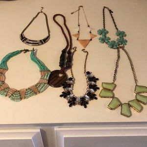7 statement necklaces.